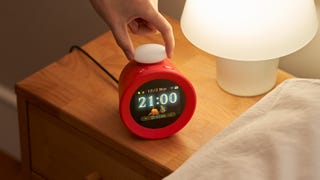 An Alarmo clock beside the bed